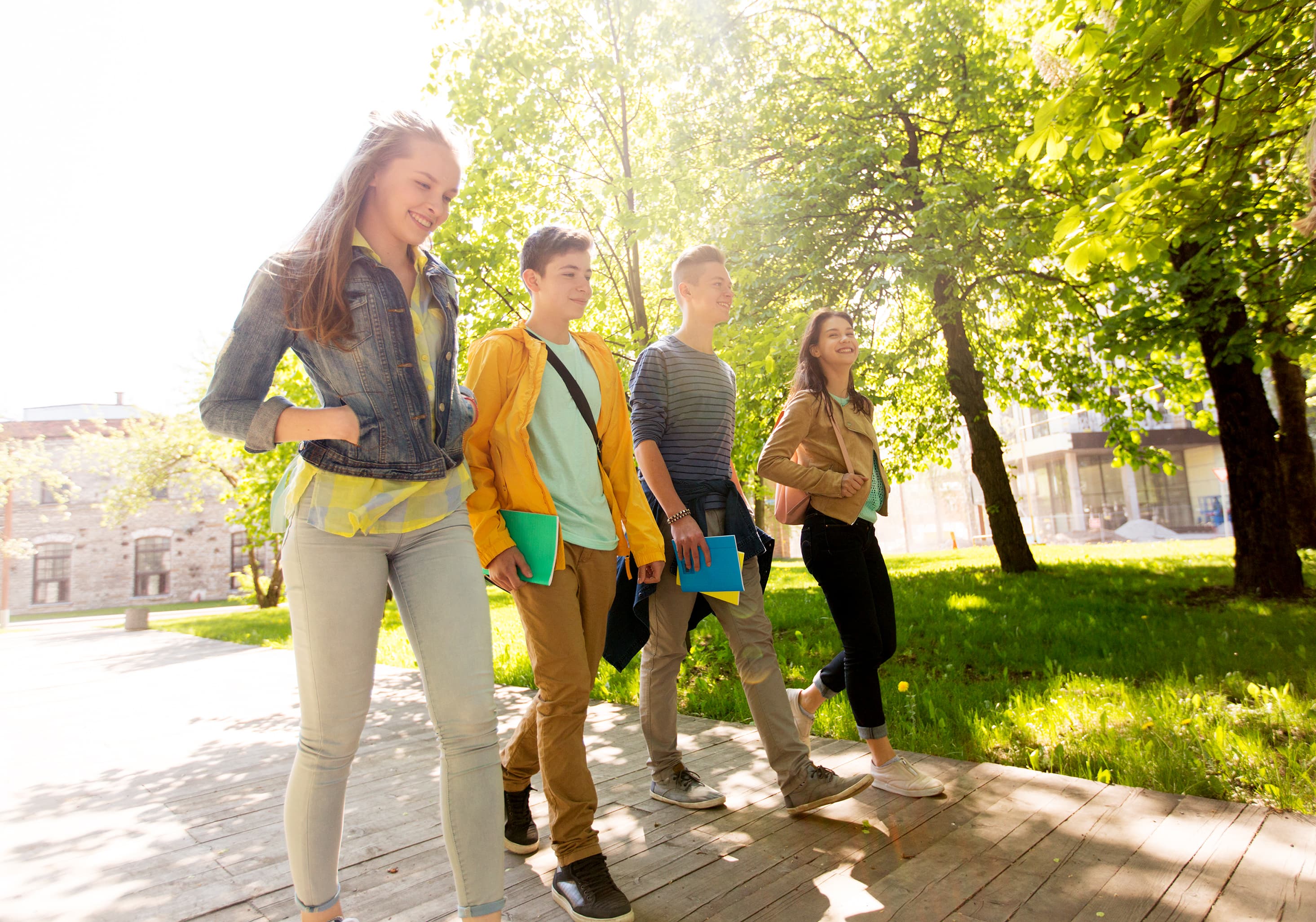 education-high-school-learning-people-concept-group-happy-teenage-students-walking-outdoors.jpg